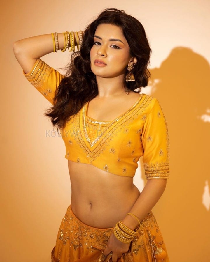 Beautiful Avneet Kaur in a Mustard Yellow Golden Lehenga Photos 03