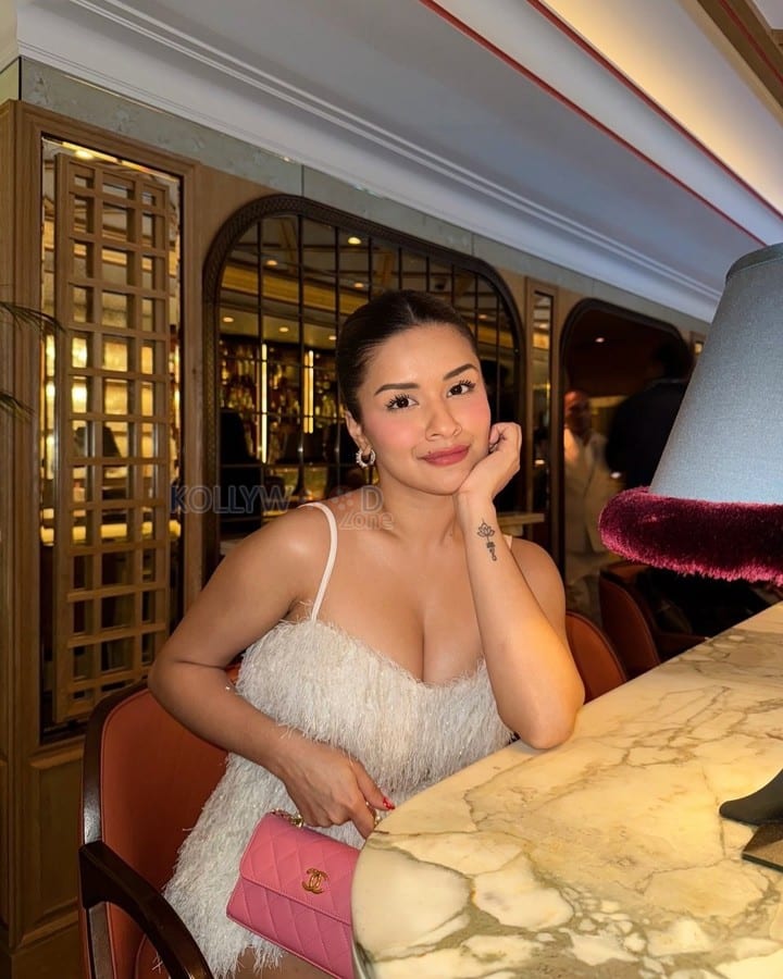 Glamorous Avneet Kaur in a White Deep Neck Mini Dress Pictures 01