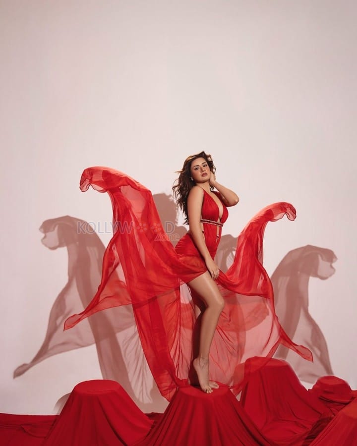 Gorgeous Avneet Kaur in a Red Gown with Deep V Neckline and Sizzling Cutouts Photos 05