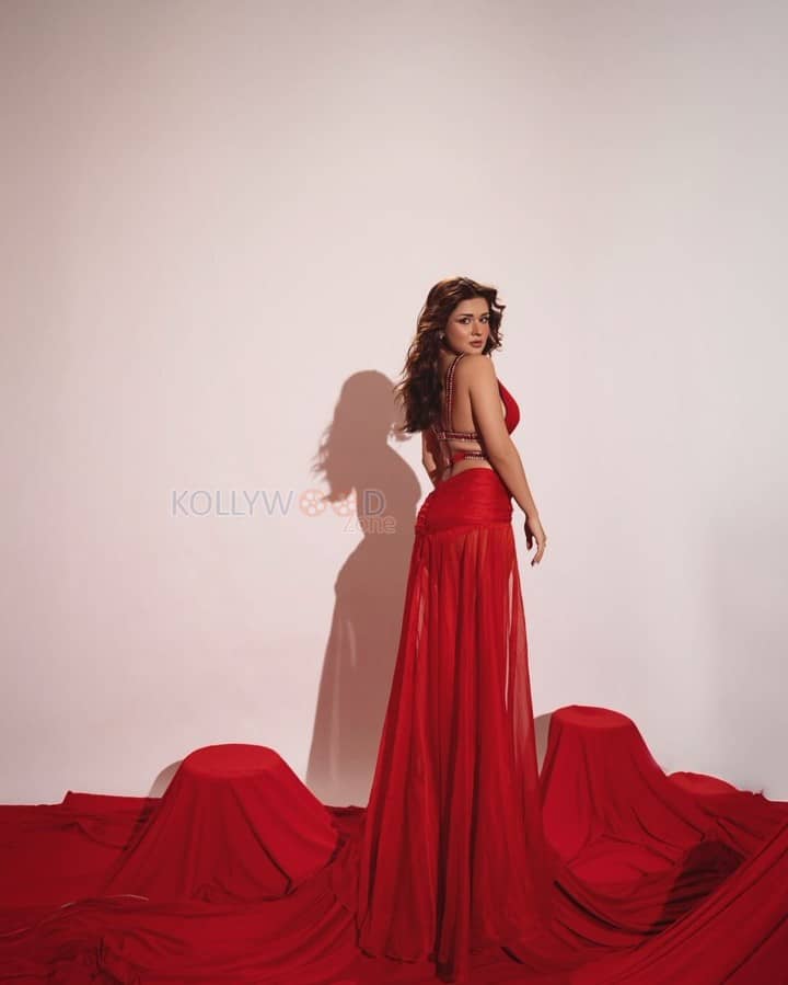 Gorgeous Avneet Kaur in a Red Gown with Deep V Neckline and Sizzling Cutouts Photos 06