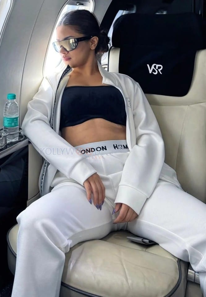 Sexy Avneet Kaur in a Black Bralette with a White Jacket and Pant Photos 02