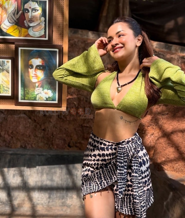 Super Hot Avneet Kaur in a Long Sleeved Olive Green Bralette with a Mini Skirt Photos 02