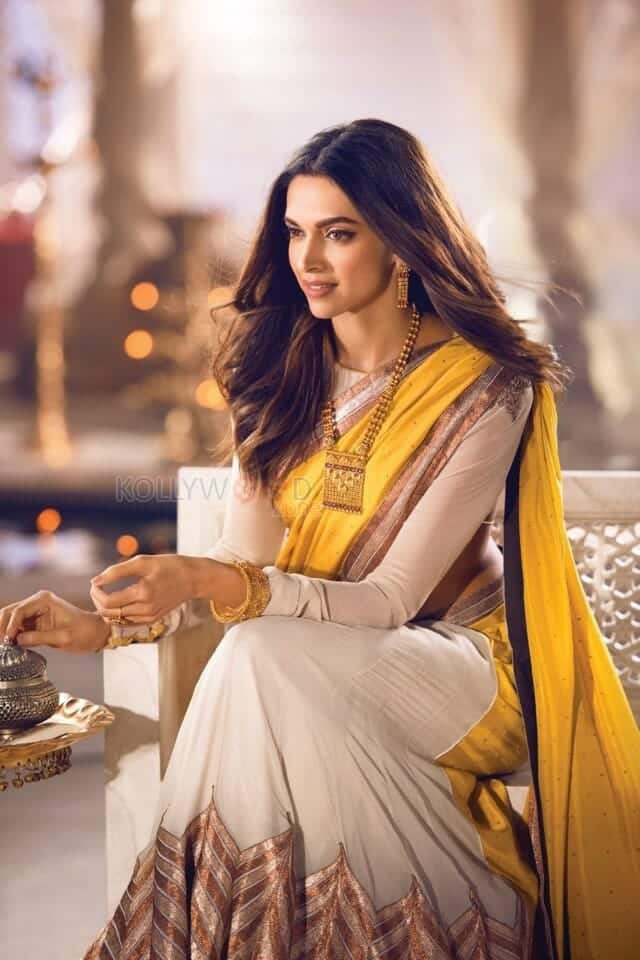 Actress Deepika Padukone in a Cream and Yellow Saree Photo 01