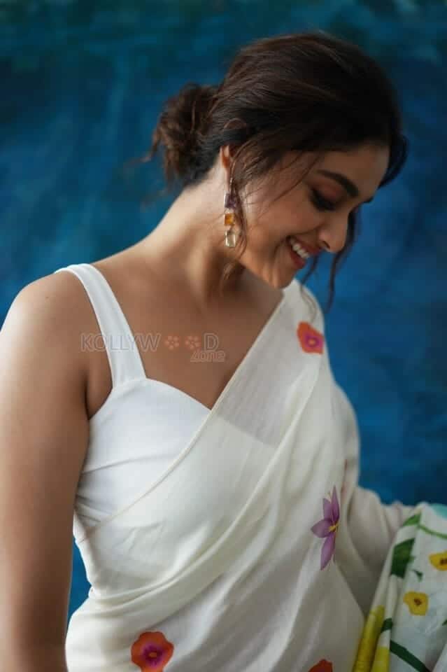 Actress Keerthy Suresh in a White Floral Saree Photos 01