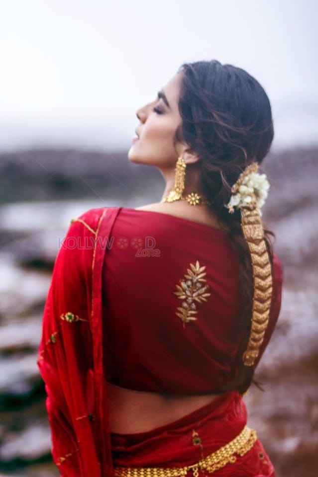Actress Malavika Mohanan Red Saree Photoshoot Stills