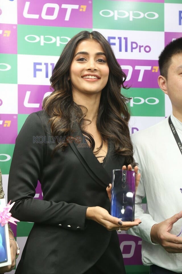 Actress Pooja Hegde At The Launch Of Oppo F Pro Mobile Photos