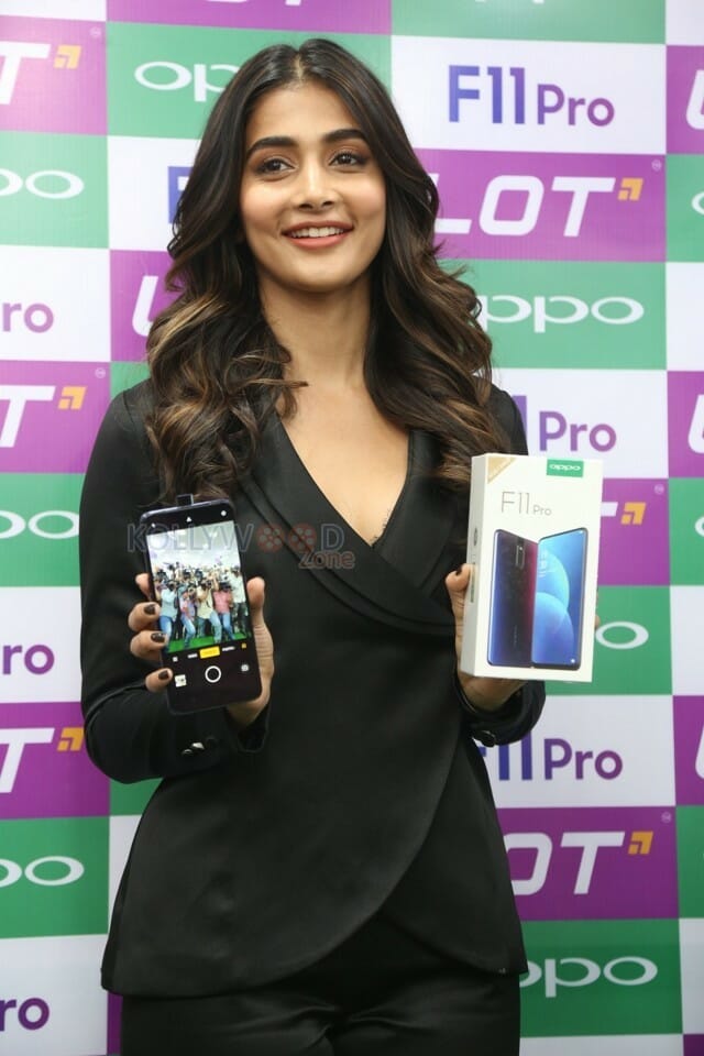Actress Pooja Hegde At The Launch Of Oppo F Pro Mobile Photos
