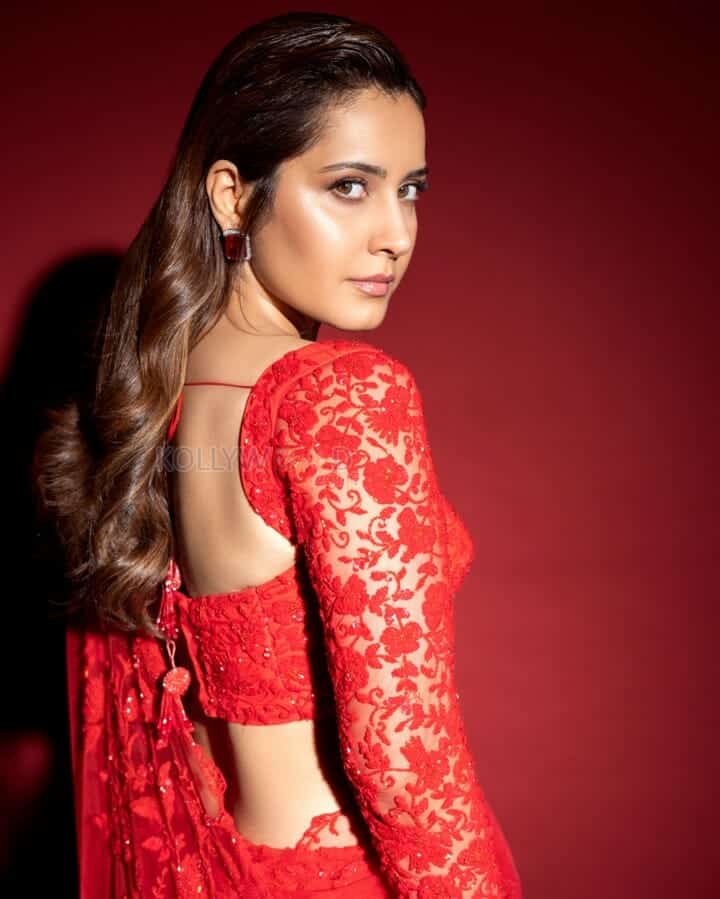 Actress Raashii Khanna in a Sheer Red Saree Photos 02