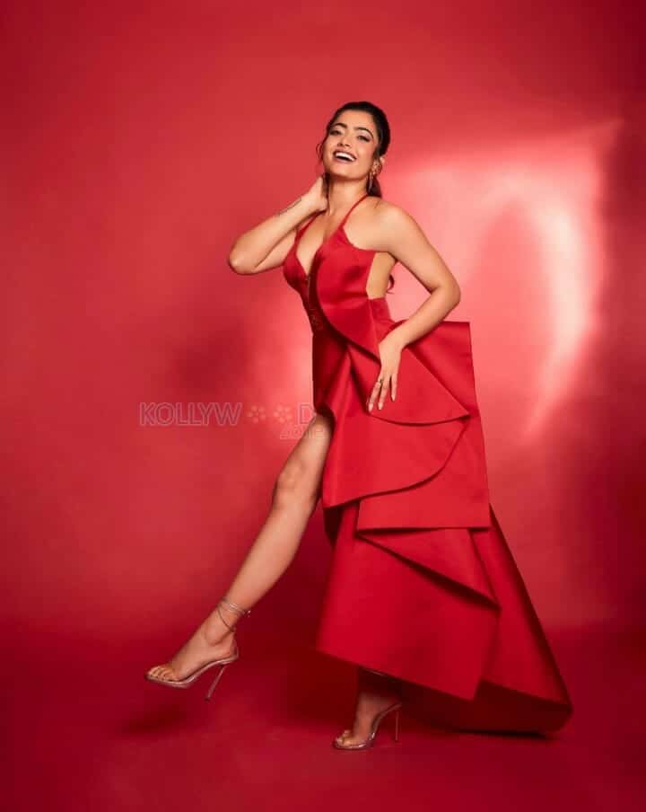 Actress Rashmika Mandanna in a Classy Red Slit Gown Photoshoot Pictures 02