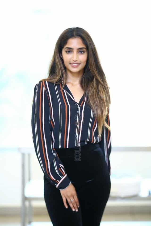 Actress Reba Monica John at FIR Movie Success Meet Photos 09