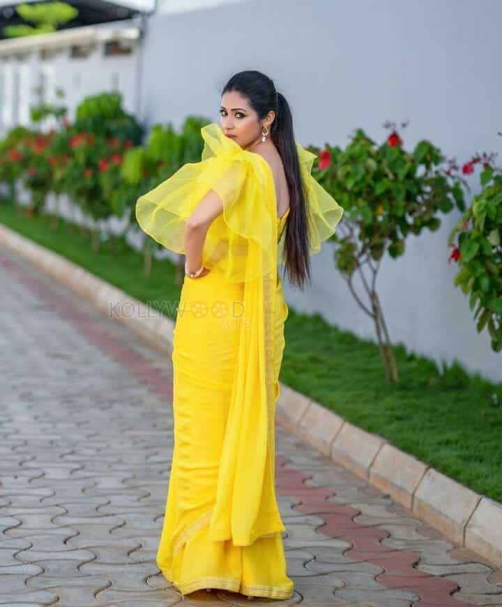 Actress Sadha in Yellow Dress Pictures 03