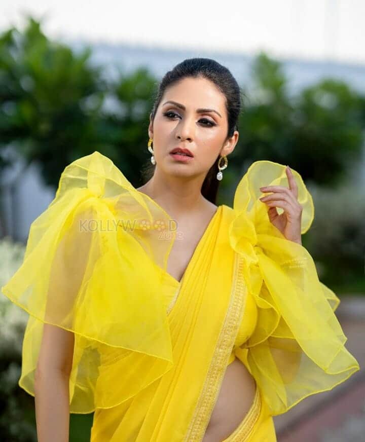 Actress Sadha in Yellow Dress Pictures 04