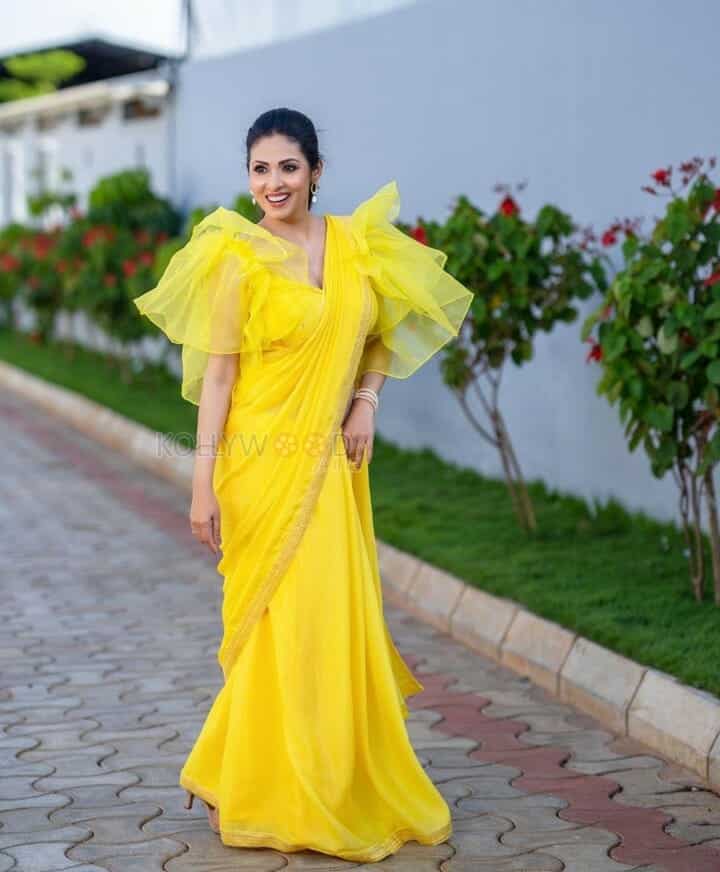 Actress Sadha in Yellow Dress Pictures 05