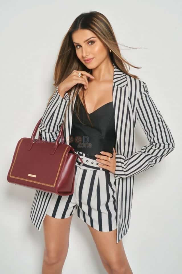 Actress Tara Sutaria in a Black and White Striped Dress Photo 01
