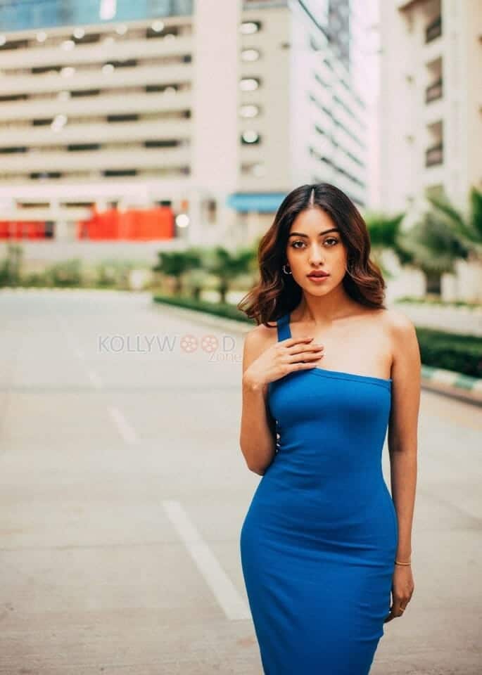 Attractive Anu Emmanuel in a Blue Dress Photoshoot Stills 01