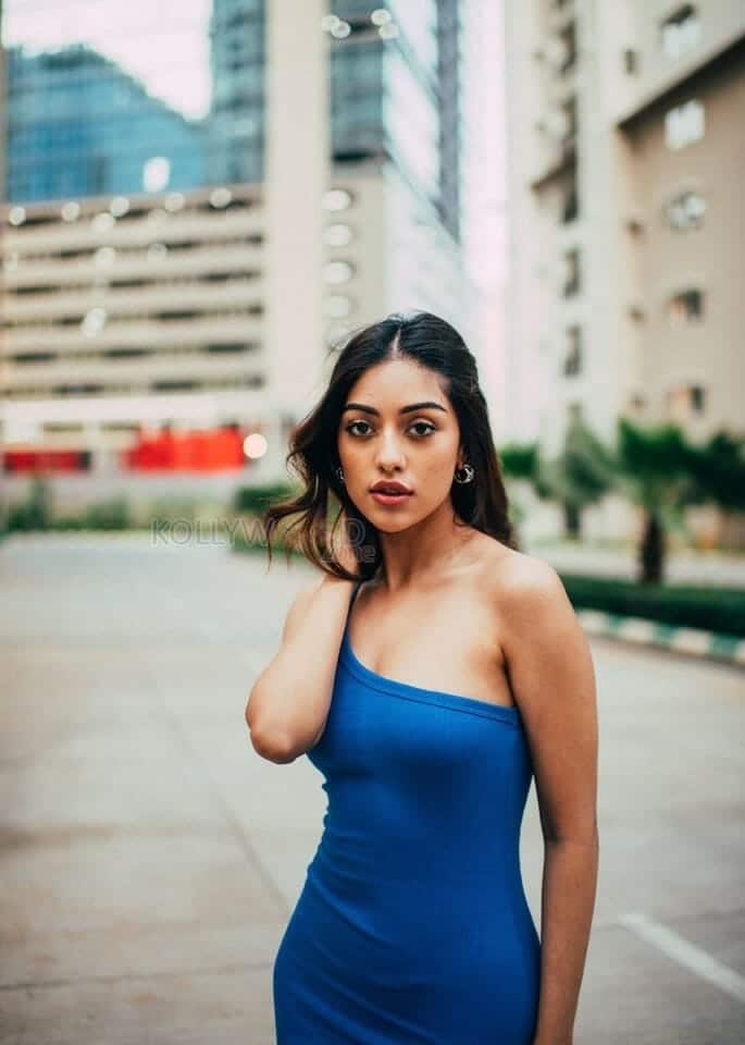 Attractive Anu Emmanuel in a Blue Dress Photoshoot Stills 05