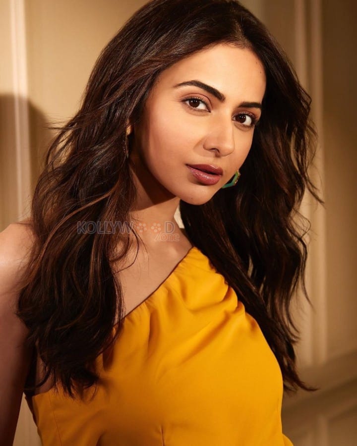 Attractive Rakul Preet Singh in a Yellow One Shoulder Mini Dress Photos 02
