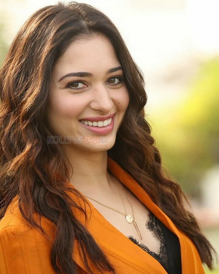 Beautiful Actress Tamanna Bhatia Orange Formal Dress Photos