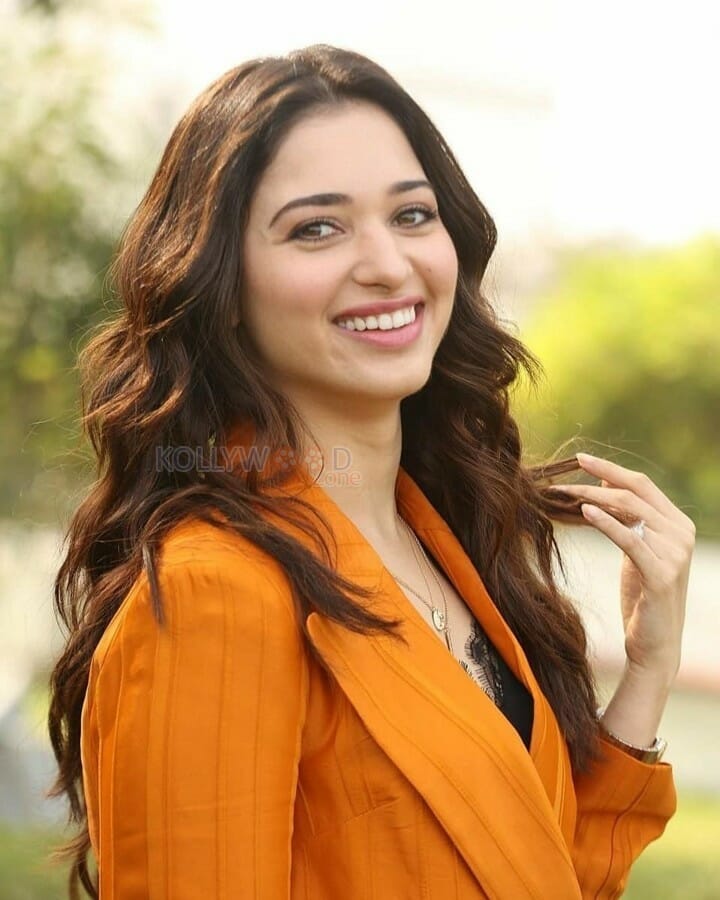 Beautiful Actress Tamanna Bhatia Orange Formal Dress Photos