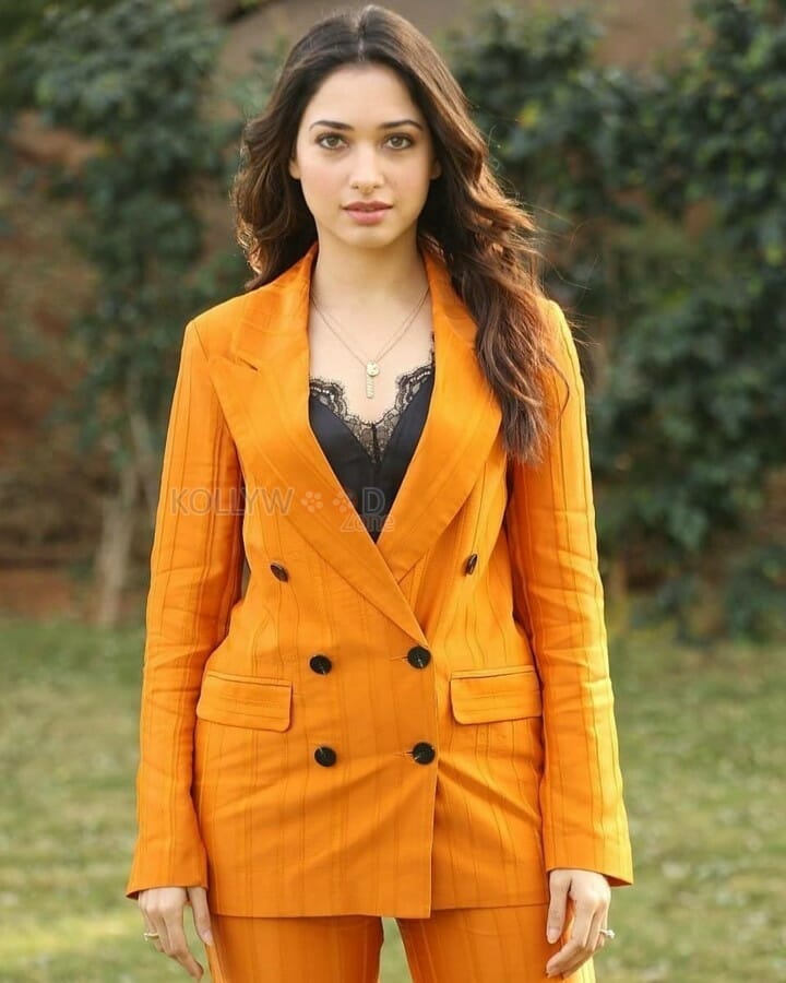 Beautiful Actress Tamanna Bhatia Orange Formal Dress Photos