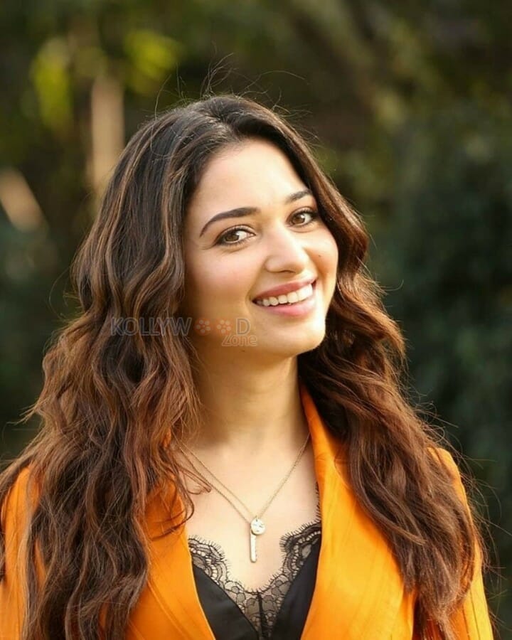 Beautiful Actress Tamanna Bhatia Orange Formal Dress Photos