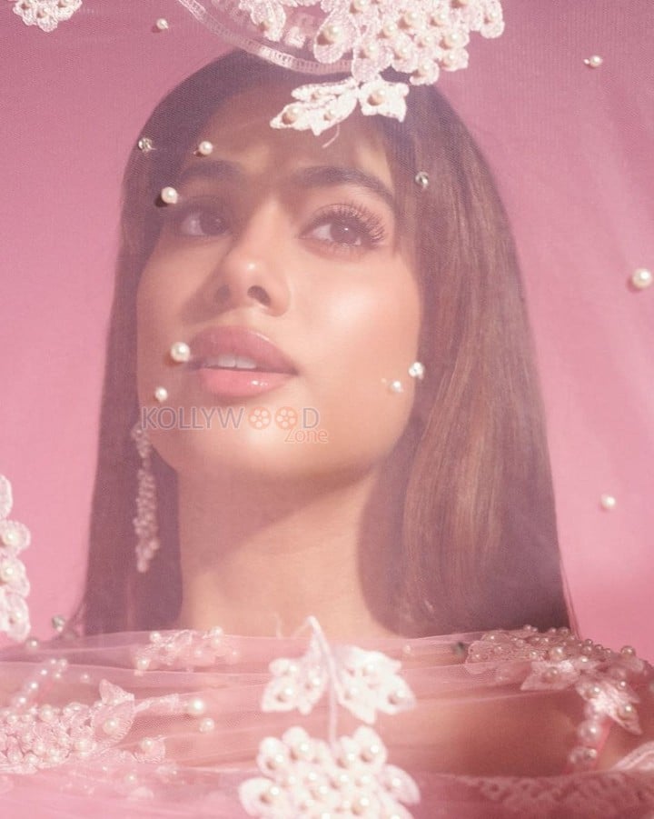 Beautiful Janhvi Kapoor in a Blush Pink Manish Malhotra Lehenga with a Sheer Blouse and Flowing Skirt Pictures 06