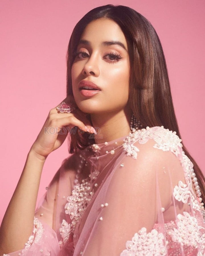 Beautiful Janhvi Kapoor in a Blush Pink Manish Malhotra Lehenga with a Sheer Blouse and Flowing Skirt Pictures 07