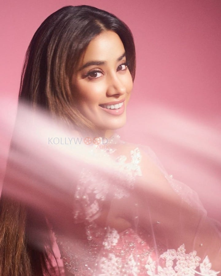 Beautiful Janhvi Kapoor in a Blush Pink Manish Malhotra Lehenga with a Sheer Blouse and Flowing Skirt Pictures 09