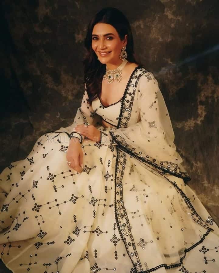 Beautiful Karishma Tanna in a Black and White Embroidered Lehenga Photos 03