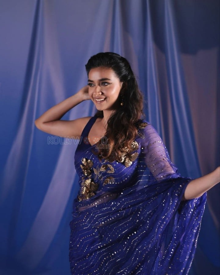 Beautiful Keerthy Suresh in a Royal Blue Sequin Saree with a Strappy Sleeveless Blouse Photos 01