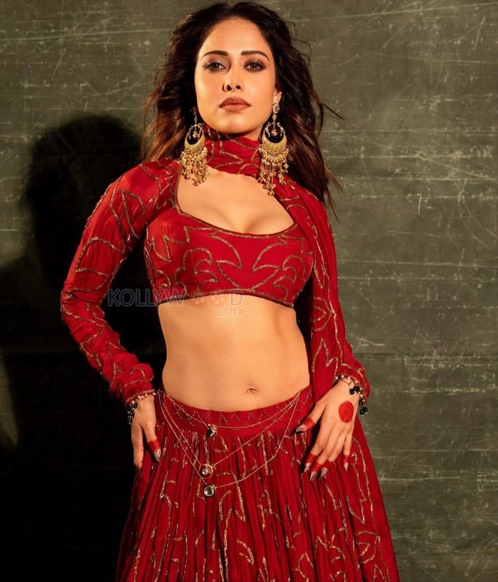 Beautiful Nushrratt Bharuccha in a Golden Embroidered Red Lehenga Pictures 03