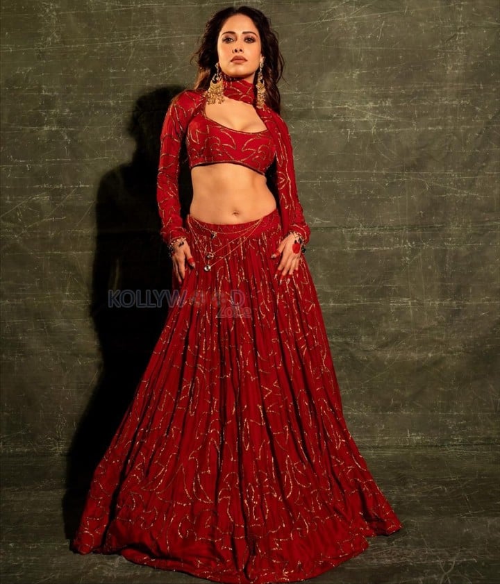 Beautiful Nushrratt Bharuccha in a Golden Embroidered Red Lehenga Pictures 06