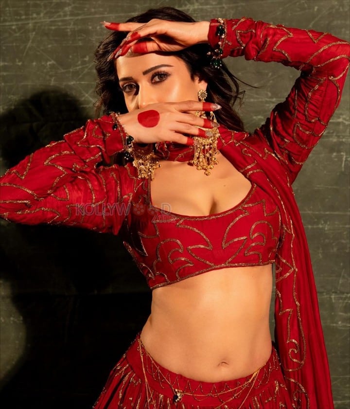 Beautiful Nushrratt Bharuccha in a Golden Embroidered Red Lehenga Pictures 10