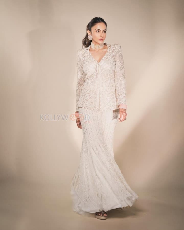 Beautiful Rakul Preet Singh in a White and Gold Sharara set Photos 01