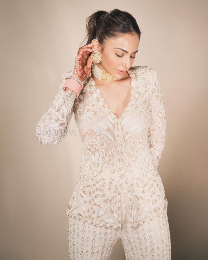 Beautiful Rakul Preet Singh in a White and Gold Sharara set Photos 03
