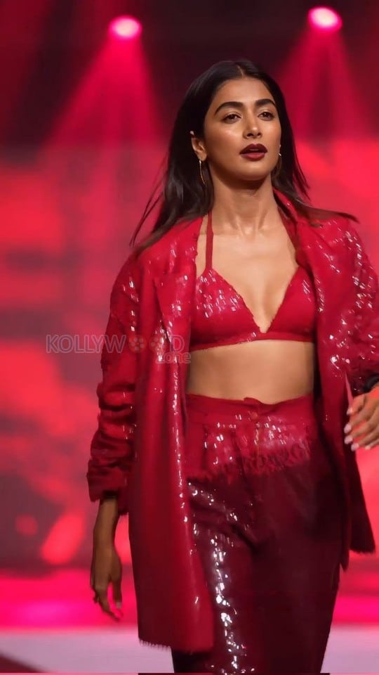 Bold Pooja Hegde in a Red Sequinned Bralette with an Oversized Blazer and Shimmery Pant at Mahindra Tech Fashion Tour Pictures 02