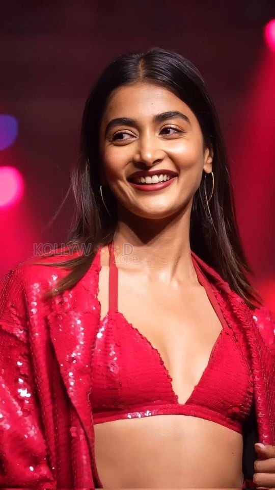 Bold Pooja Hegde in a Red Sequinned Bralette with an Oversized Blazer and Shimmery Pant at Mahindra Tech Fashion Tour Pictures 03