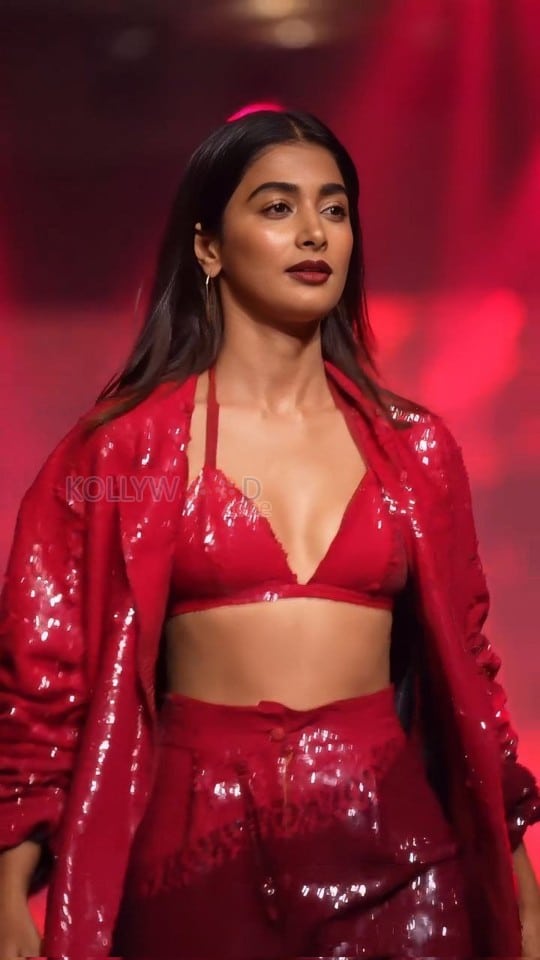 Bold Pooja Hegde in a Red Sequinned Bralette with an Oversized Blazer and Shimmery Pant at Mahindra Tech Fashion Tour Pictures 04