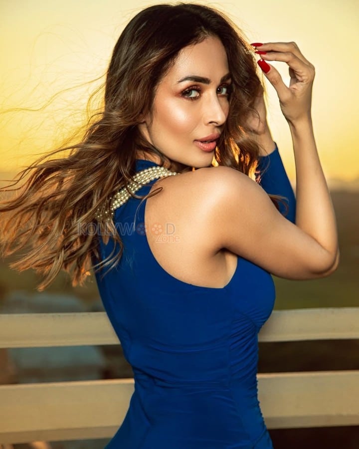 Bold and Beautiful Malaika Arora in a Blue Thigh Slit Dress Photos 02