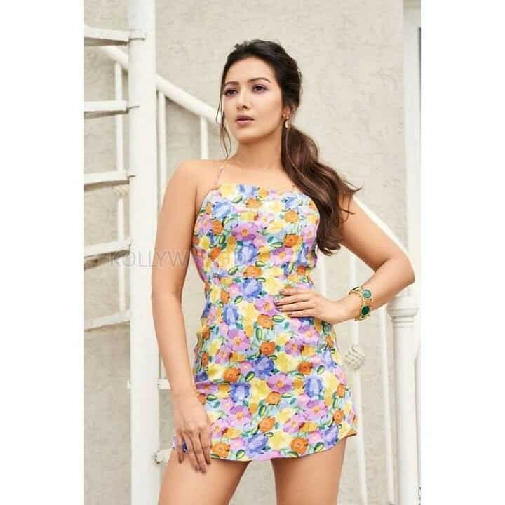 Catherine Tresa in a Colourful Floral Top Photos 01