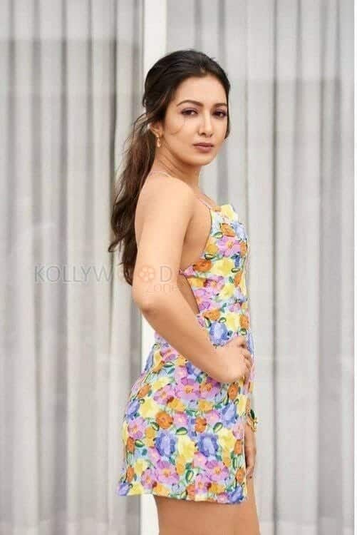 Catherine Tresa in a Colourful Floral Top Photos 04