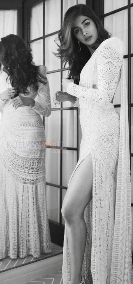 Charming Pooja Hegde in a White Thigh Slit Saree Monochrome Pictures01