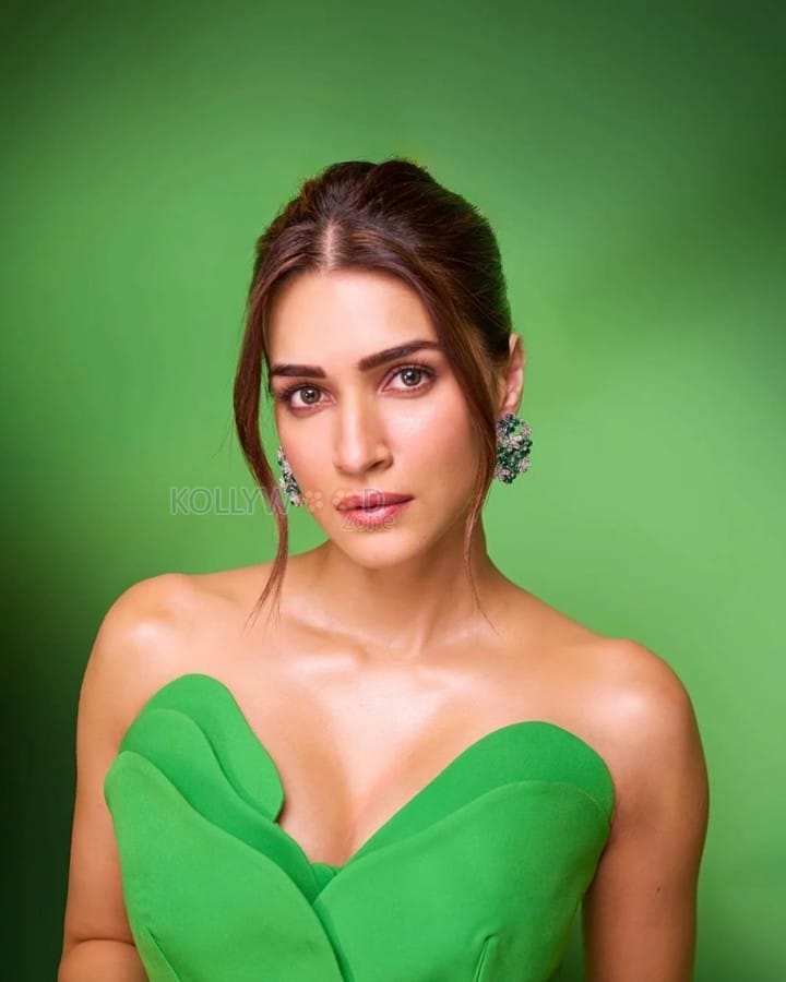 Classy Kriti Sanon in a Fouad Sarkis Green Satin Strapless Bodycon Gown Embelished with Drapes Photos 01