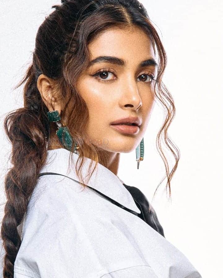 Classy Pooja Hegde in a White Full Sleeve Crop Shirt and Black Pant Photos 03