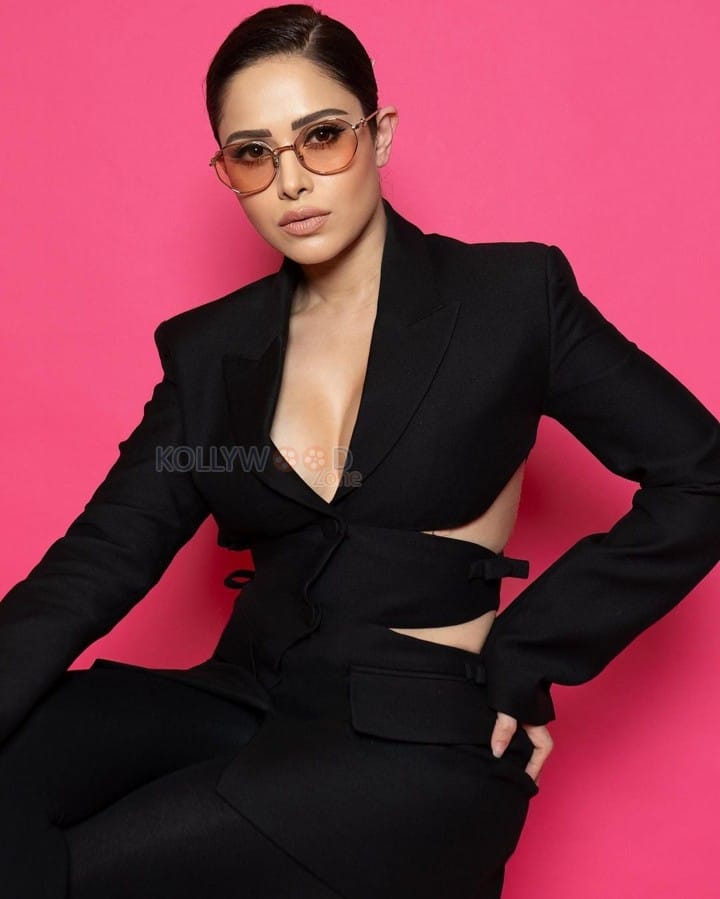 Cleavage Baring Nushrratt Bharuccha in a Black Pant Suit Pictures 01