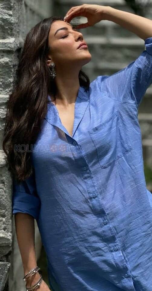 Cute Kajal Aggarwal in a Blue Long Shirt Photos 02