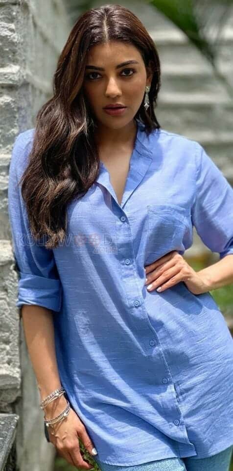 Cute Kajal Aggarwal in a Blue Long Shirt Photos 03