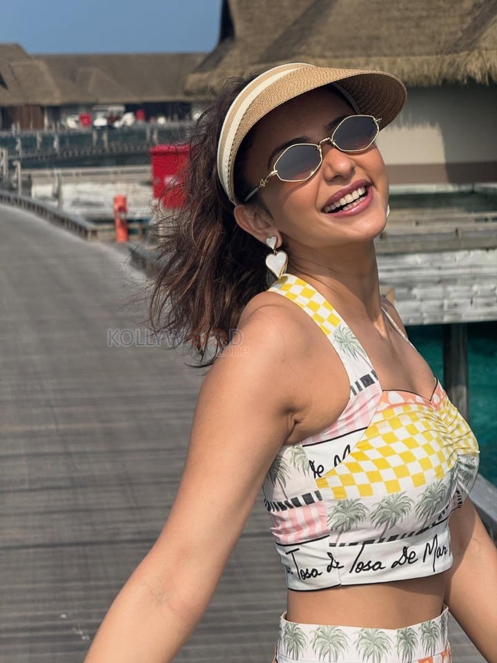 Cute Rakul Preet Singh in a Yellow and White Printed Bralette Top and Mini Skirt Pictures 02
