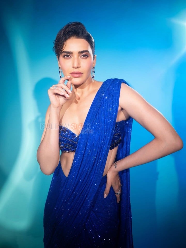 Dazzling Karishma Tanna in a Royal Blue Sequin Shimmery Saree with a Sleeveless Blouse Photos 07