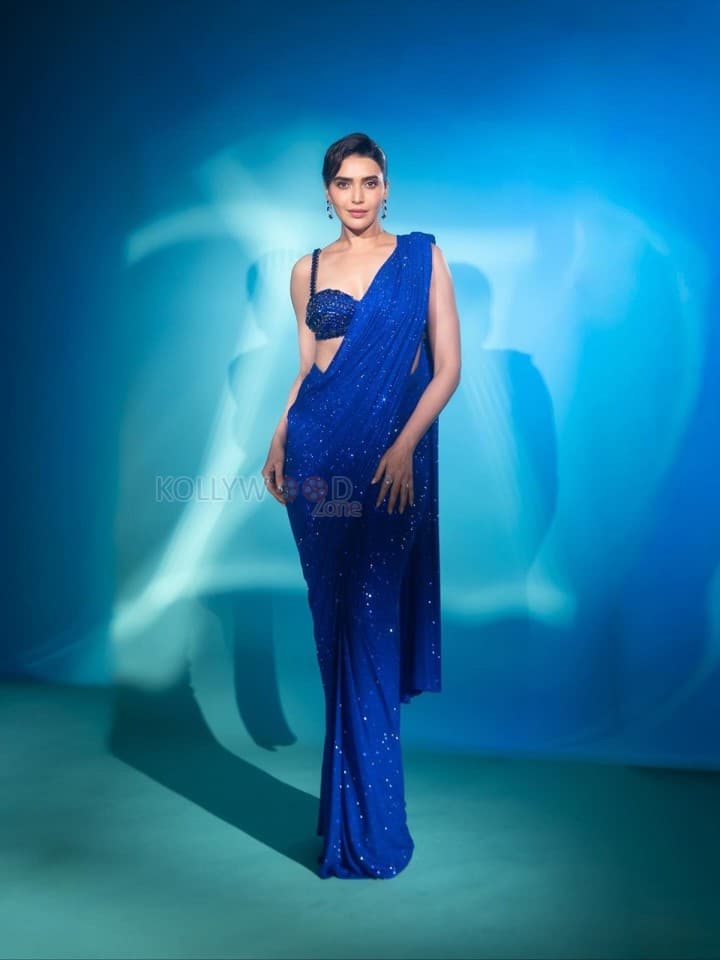 Dazzling Karishma Tanna in a Royal Blue Sequin Shimmery Saree with a Sleeveless Blouse Photos 09